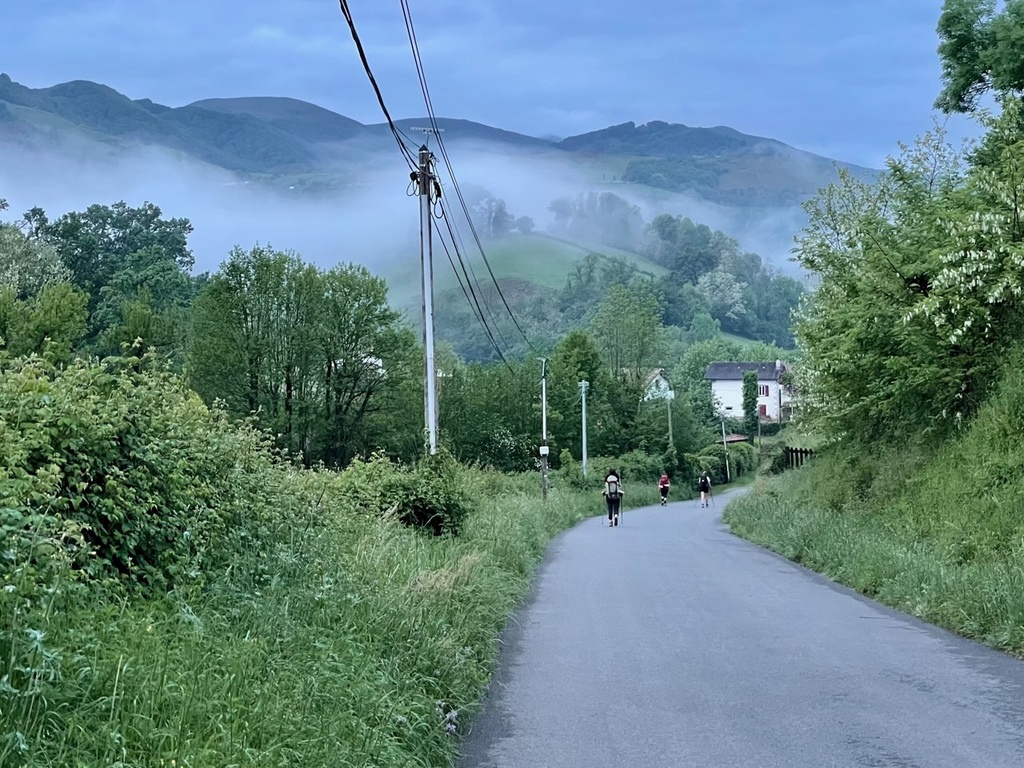Heading out of Saint-Jean-Pied-de-Port with low clouds and fog. Honestly, I relieved not to see the sun, considering what was in front of me.