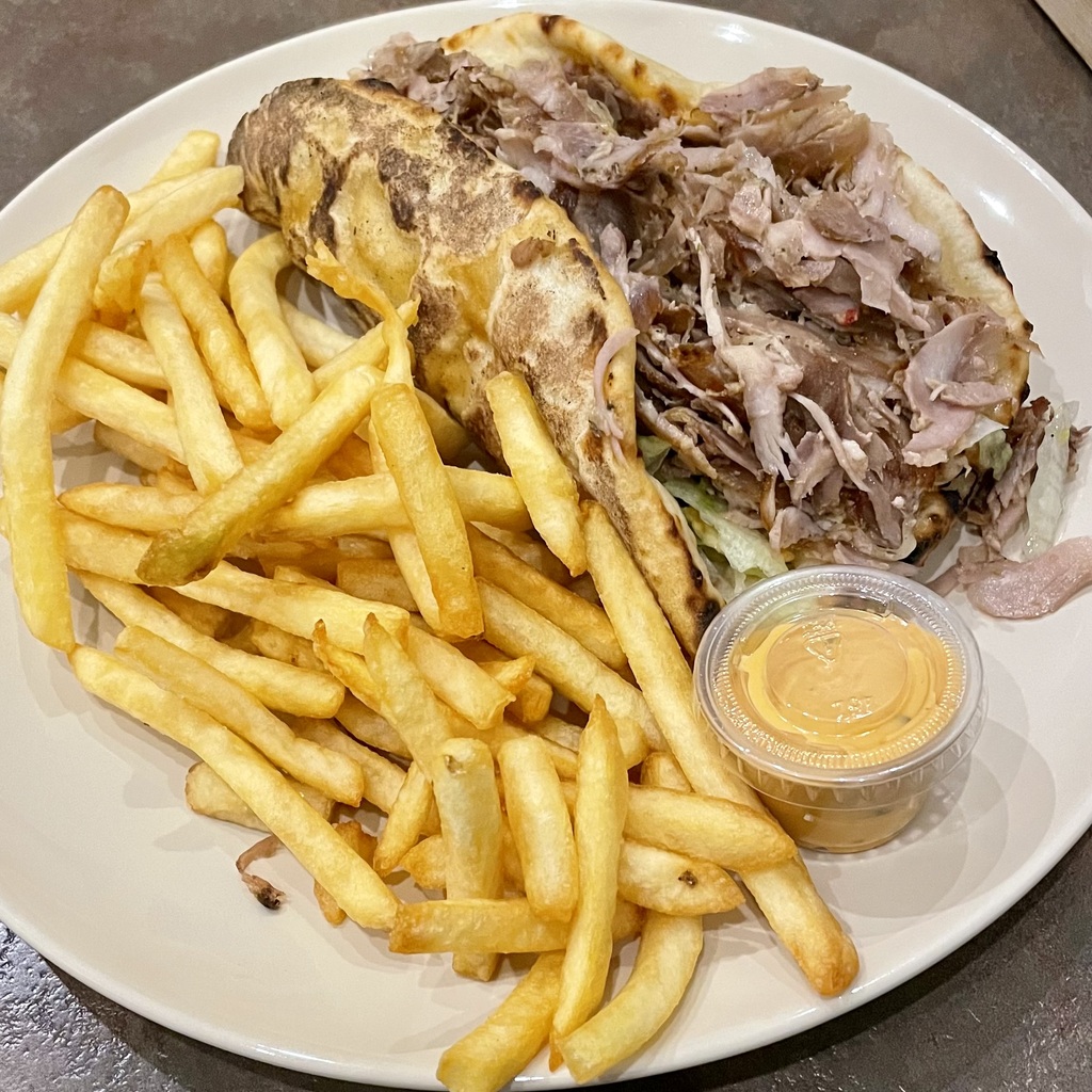 <em>Naan kebab</em> with fries, <em>andalouse</em> sauce on the side.