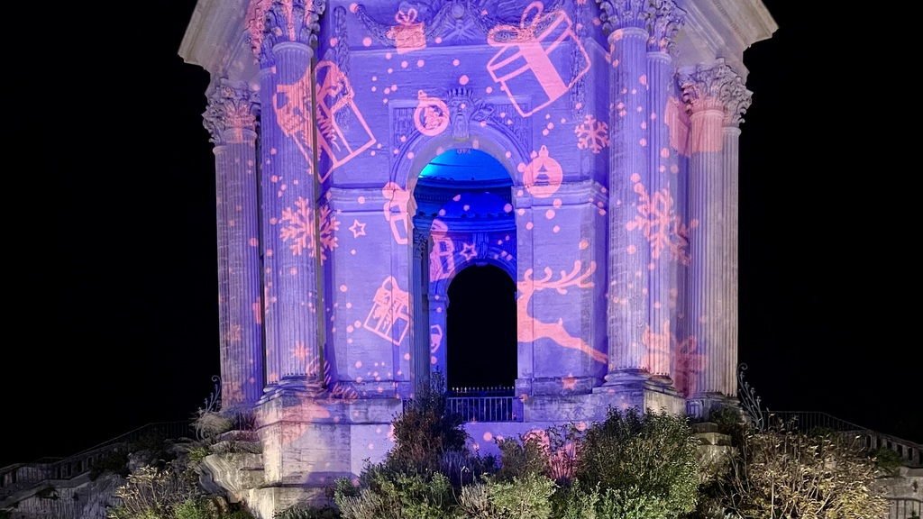 Chateau d’Eau with a holiday-themed projection.