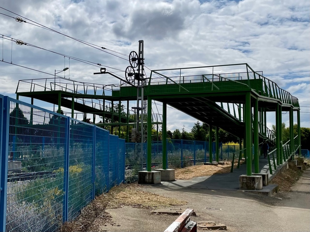 All this so that pilgrims don’t have to cross the railroad tracks. At first I wondered why they didn’t simply tunnel under the tracks, but then I noticed how swampy the land was.